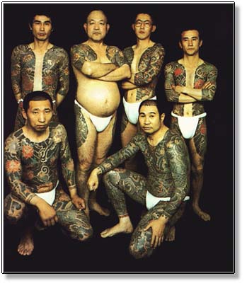 Apropos of nothing, here's some images of Yakuza showing off their tattoos.